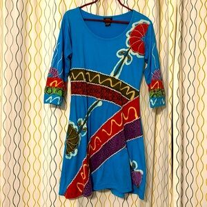 Tie dye, bohemian dress, boutique purchase from a shop in Palo Alto.